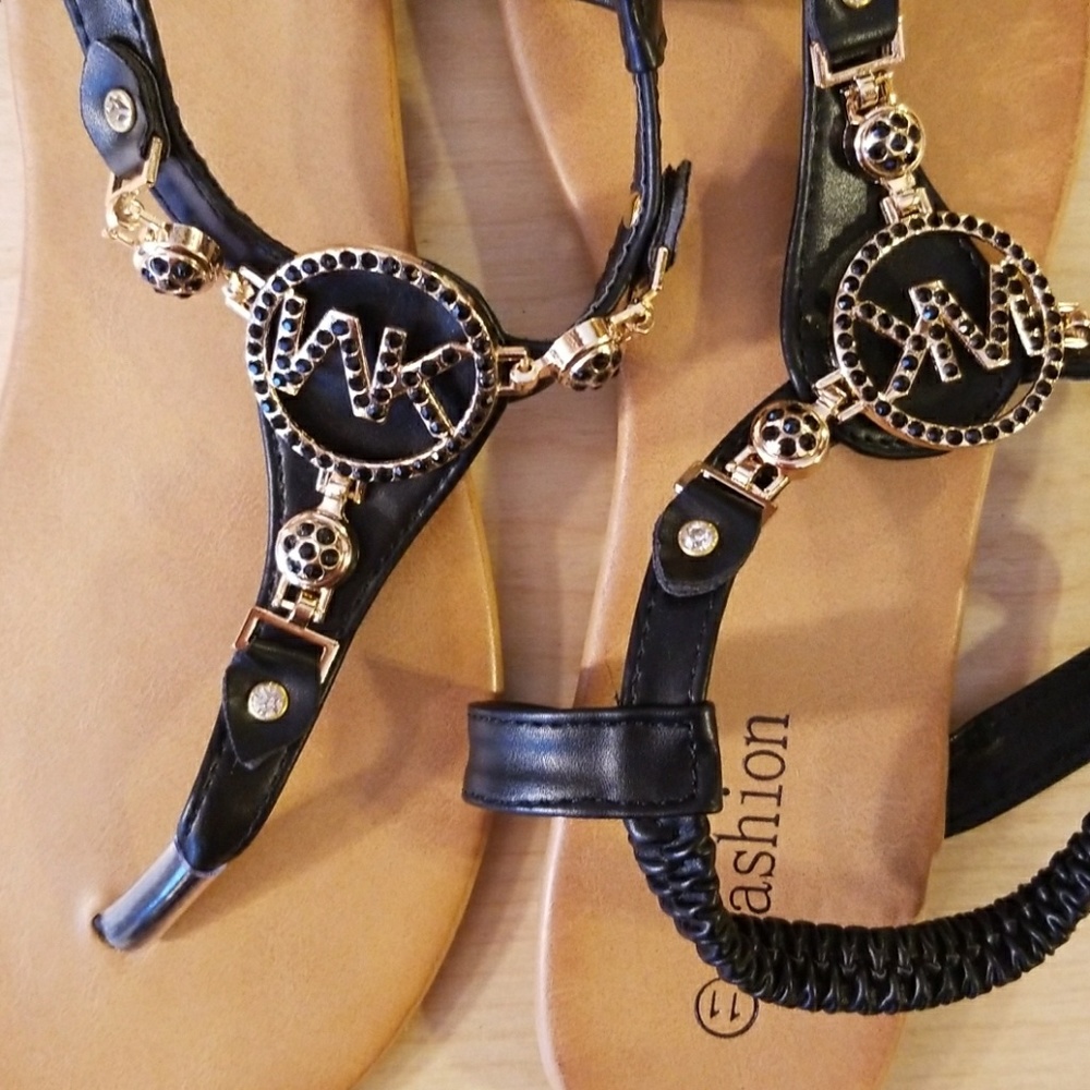 New black and gold sandals